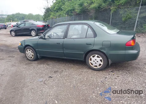 2000 Toyota Corolla Le from USA, damaged, VIN 2T1BR12E2YC309516